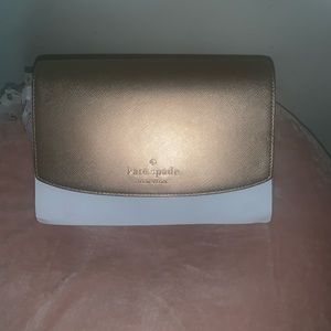 Kate spade gold metallic bag .